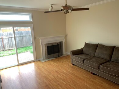 Living room with sliding door to patio and Backyar