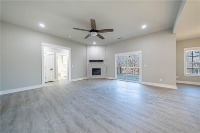 Very large great room with beautiful stone fireplace