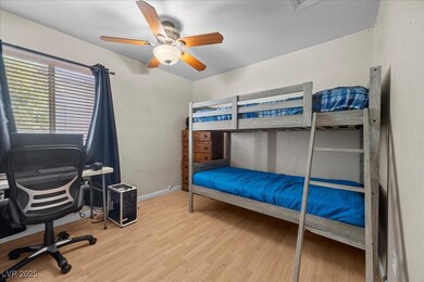 Bedroom featuring wood finished floors and ceiling