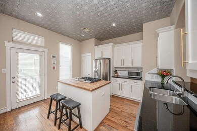 Open kitchen, wood block island with lots of cabin