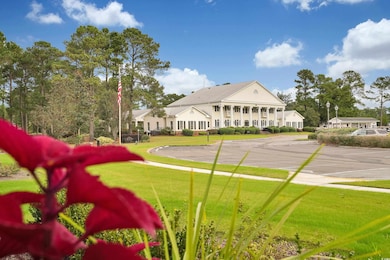 View of home's community featuring a lawn
