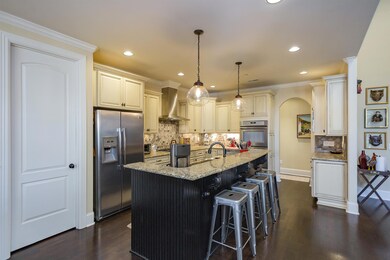 Nice, Open, Eat-In Kitchen Area featuring Granite Counter & Stainless Appliances. Open to Great Room.