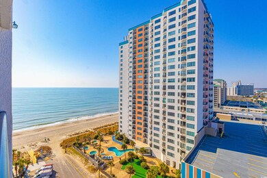 View of building exterior with a water view and a 