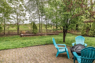Fenced yard, tree-lined