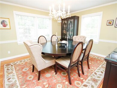 Inviting dining room with beautiful moldings.