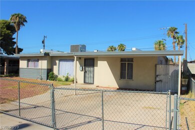 Two car carport with fully fenced yard