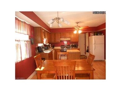 Spacious Eat-In Kitchen with Laminate Wood Looking