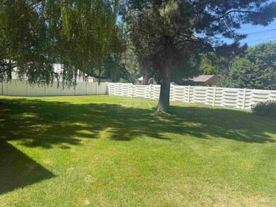 View of fenced backyard