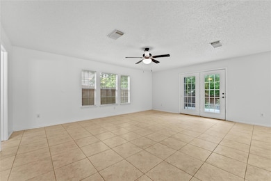 Unfurnished room with a ceiling fan, plenty of na