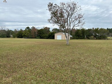 Great storage building in rear