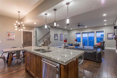 Granite kitchen island with dual bucket