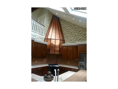 Stunning kitchen with cathedral ceiling with view 