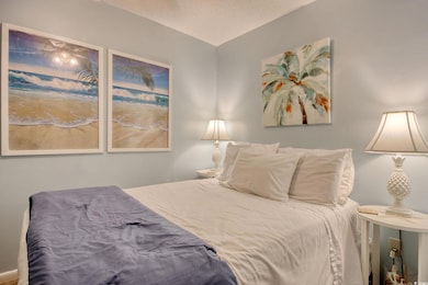 Bedroom with a textured ceiling