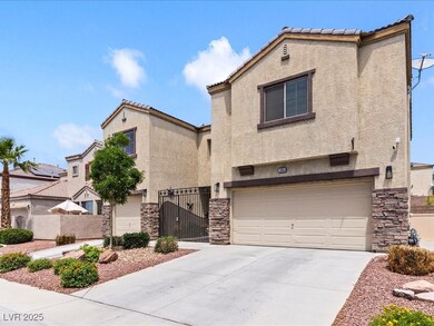 View of front of house with stucco siding, a garag