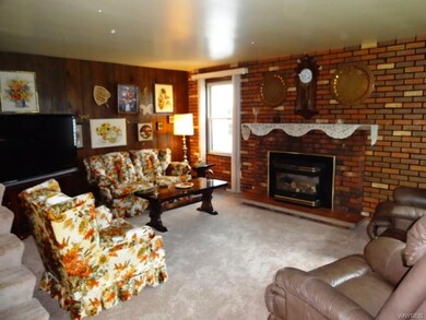 Cozy Living Room with Gas FP insert and Mantle