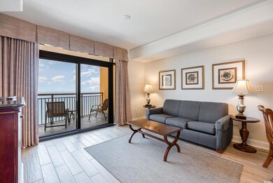Living room featuring light hardwood / wood-style 