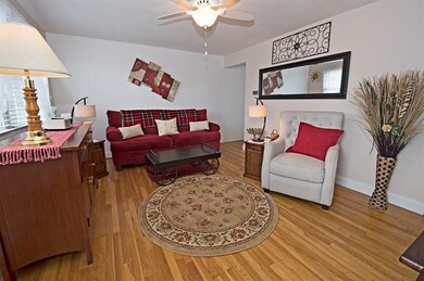 STEP INDOORS TO THE WELCOMING LIVING ROOM WHICH BO