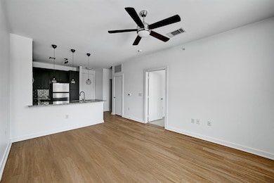 Unfurnished living room with baseboards, a ceilin