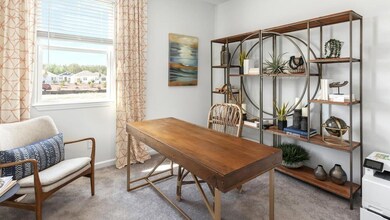 Home office featuring carpet flooring