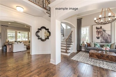 Beautiful hardwood flooring, arched doorways, open
