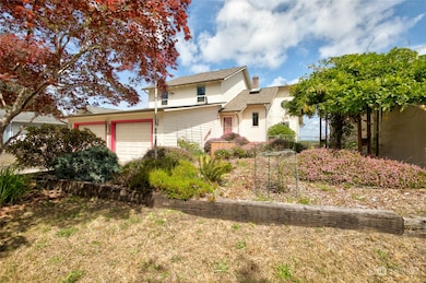 Front yard is terraced and landscaped.