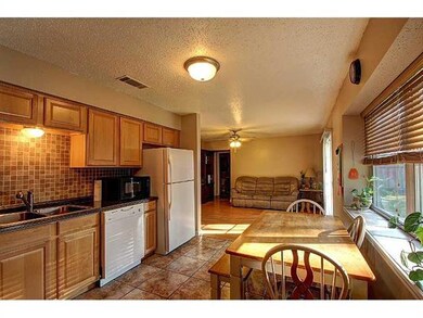 Kitchen. A picture looking from the garage door en