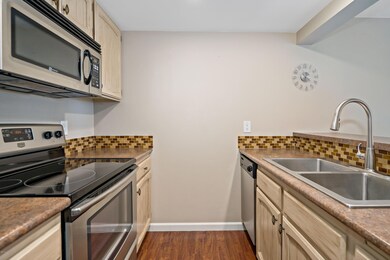 Newer cabinets, countertops, backsplash