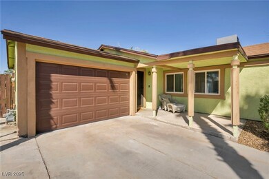 Ranch-style house featuring an attached garage, dr