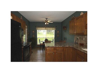 Kitchen. Granite counter tops. Pull out drawers in