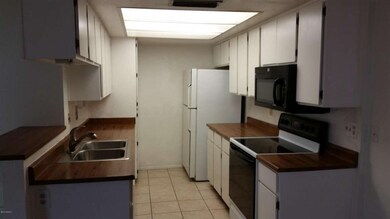 Kitchen is open to Dining area