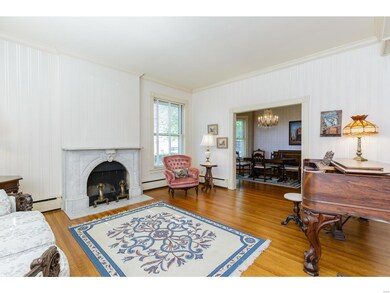 Living Room with 10 Foot Ceilings, Fireplace and O