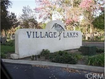 Entrance into the Village Lakes from 5th Street.