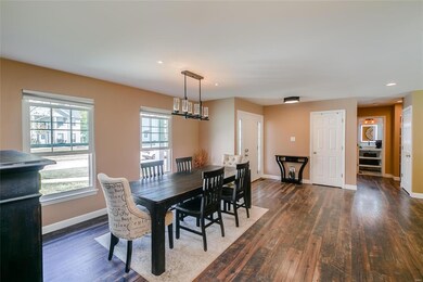 Spacious dining area!  Newer Anderson windows.