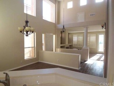 Looking out from kitchen into dining room and livi
