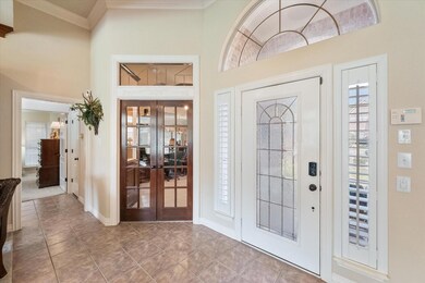 Entryway- French doors lead to office