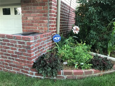 Great landscape all around the home - brick hideou