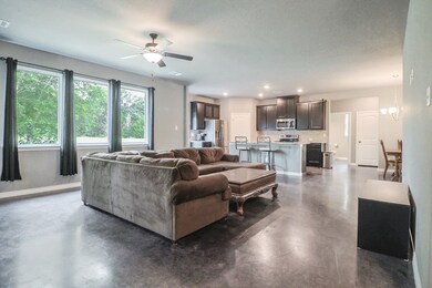 Living Room and Kitchen.
