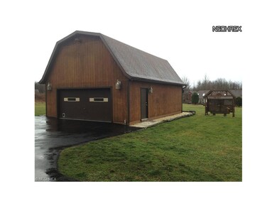 Huge detached heated garage with 300amp service. P