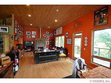 Other. Towards living area, maple flooring.