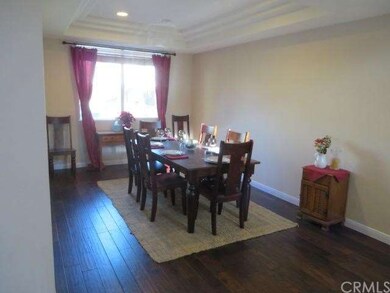 Dining area.  notice the hardwood floors and coffe