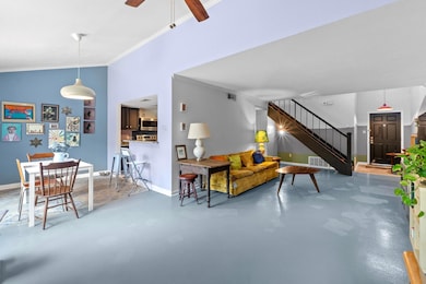 Living area with finished concrete flooring, orna