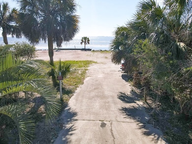 Concrete driveway entrance off Hwy 98W road