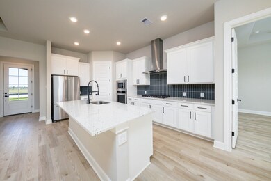 The kitchen island serves as a multifunctional hub