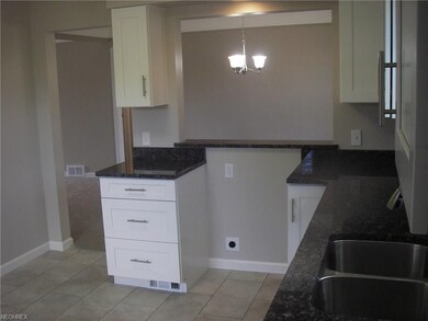 VIEW OF ALL NEW KITCHEN PASS THROUGH TO DINING ROOM