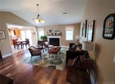 Living room with wood burning fireplace