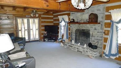 Large and Cozy Living Room/Den With Fireplace
