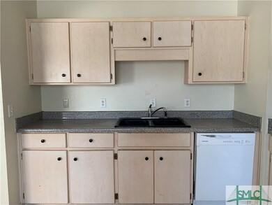 Kitchen has ample cabinetry