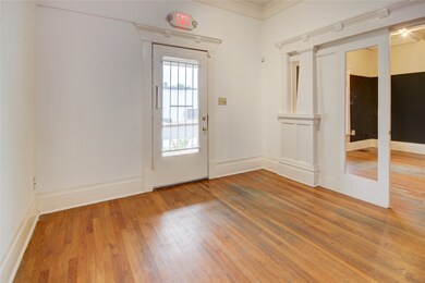 The front door opens to a charming entry space, fe