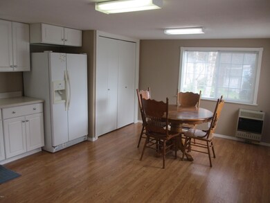 Wood floor and open kitchen