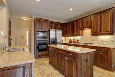 Large island kitchen with undercounter lighitng, g